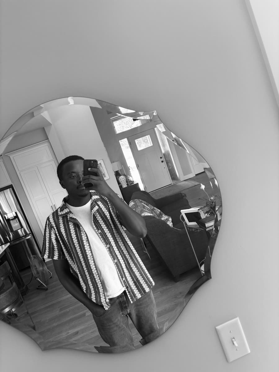 Eugene Lotsu taking a mirror portrait